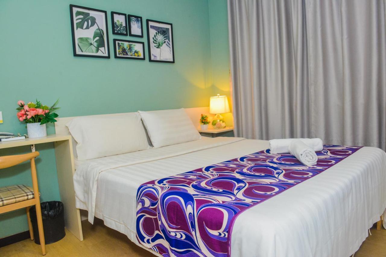 Treeline Urban Inn Кота-Кинабалу Экстерьер фото