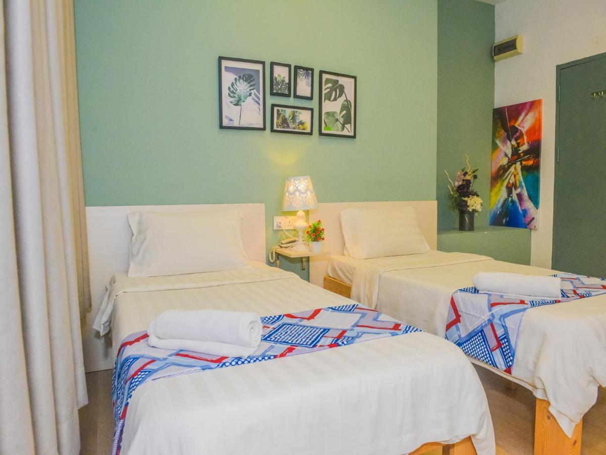 Treeline Urban Inn Кота-Кинабалу Экстерьер фото