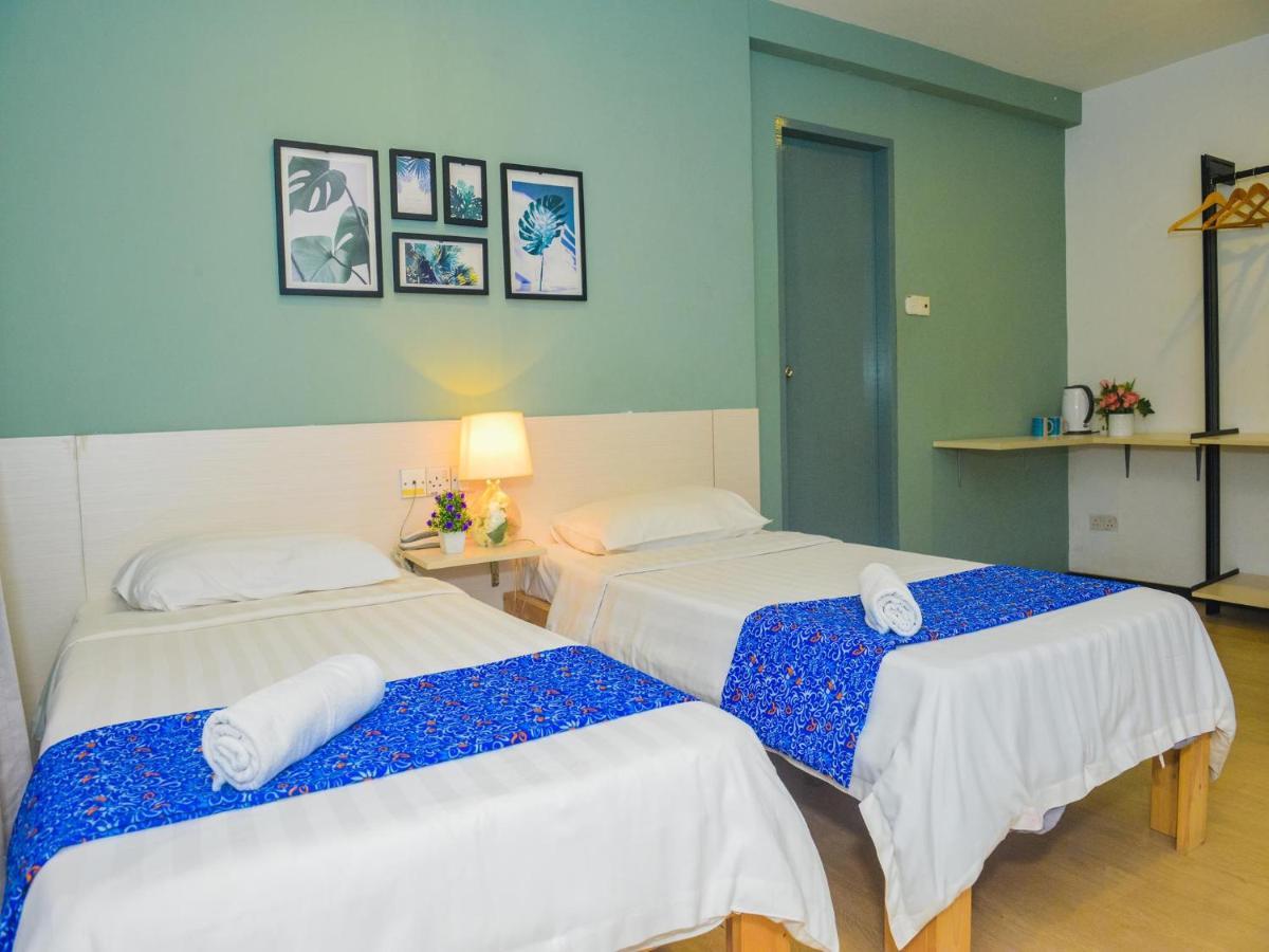 Treeline Urban Inn Кота-Кинабалу Экстерьер фото
