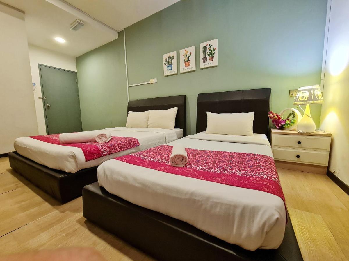 Treeline Urban Inn Кота-Кинабалу Экстерьер фото