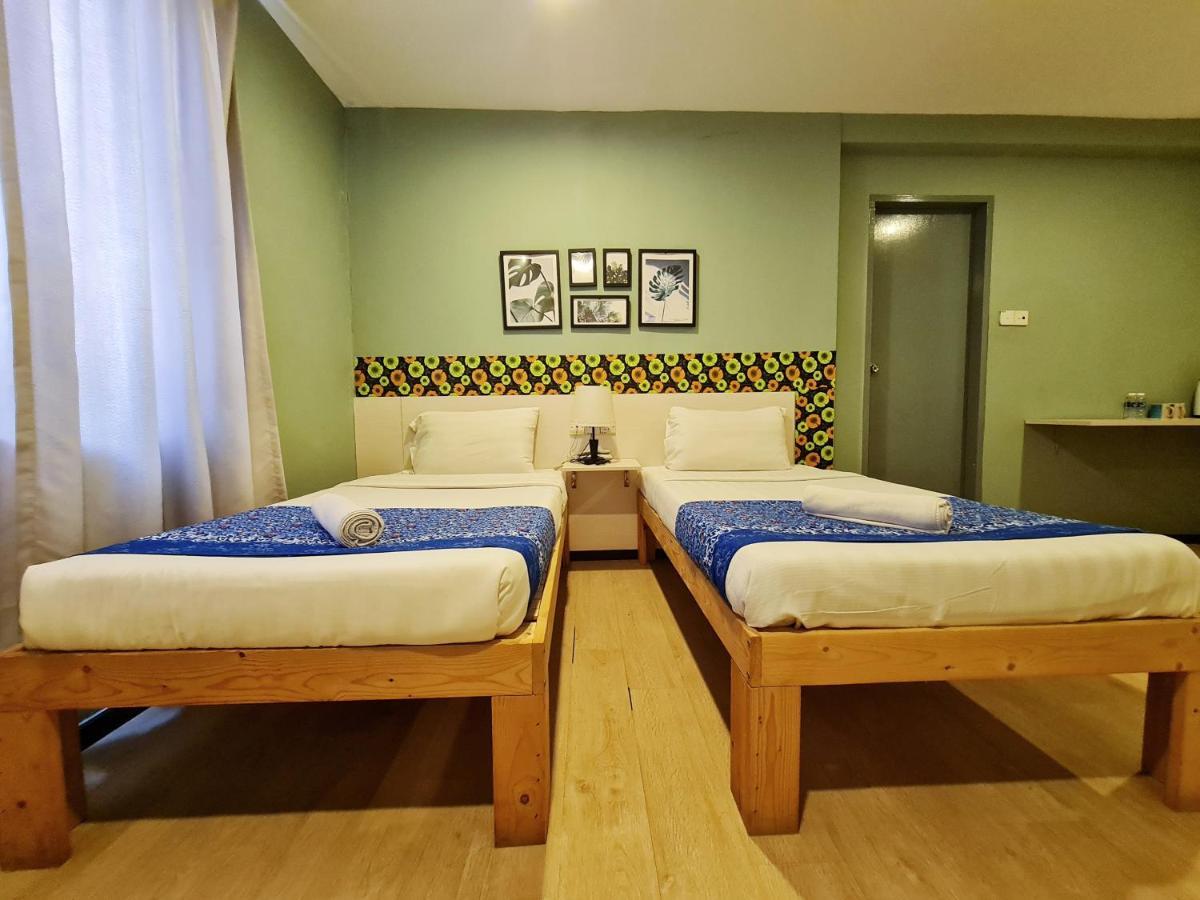 Treeline Urban Inn Кота-Кинабалу Экстерьер фото