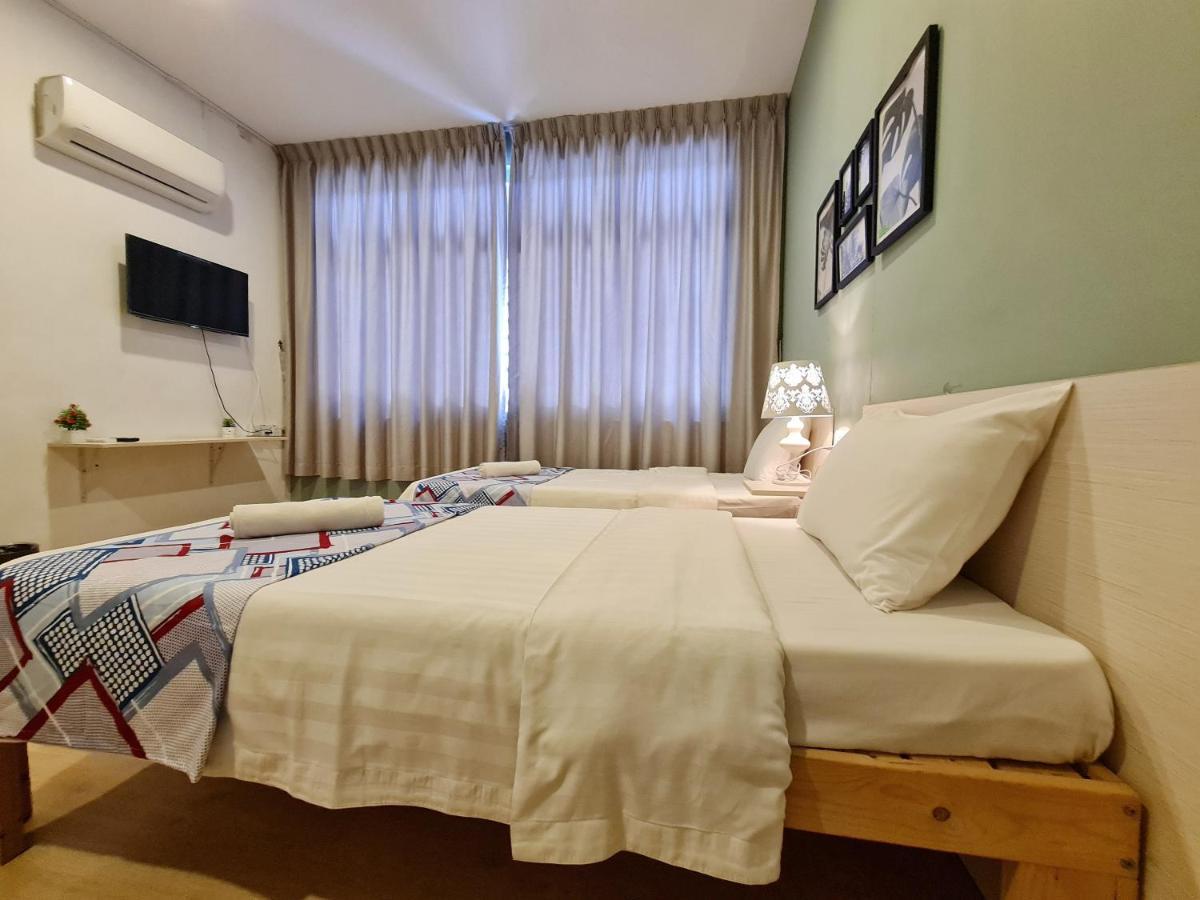 Treeline Urban Inn Кота-Кинабалу Экстерьер фото