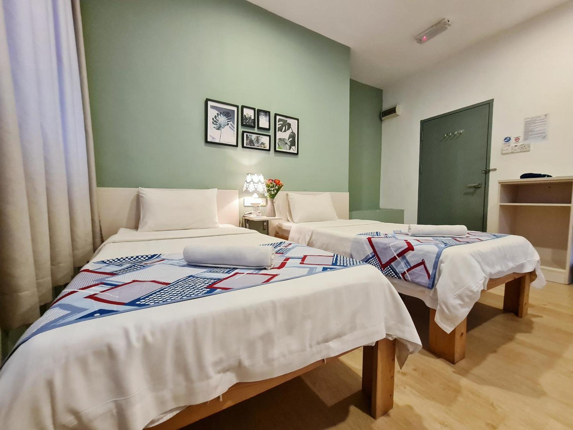 Treeline Urban Inn Кота-Кинабалу Экстерьер фото
